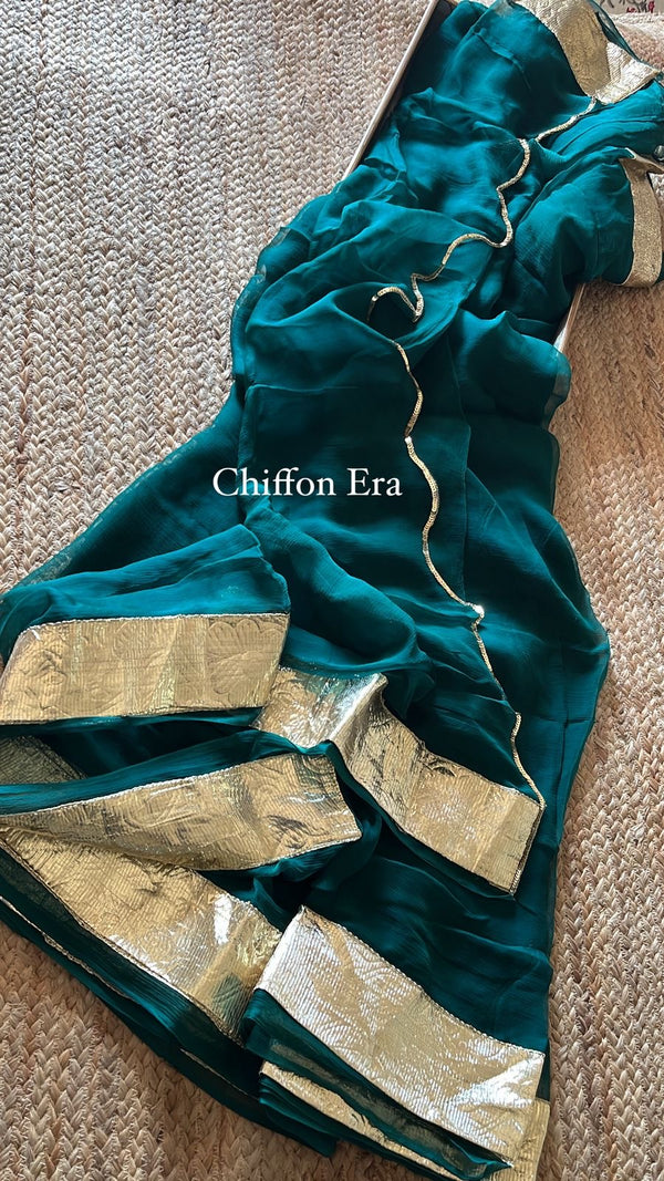 Teal blue laffa gold saree in pure chiffon fabric with crepe blouse and scallop edges