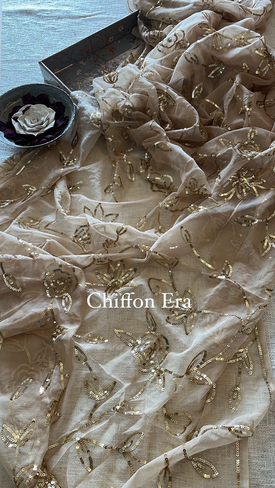 Chiffon aesthetically jewelled with golden sequins jaal all over with beautiful crepe blouse