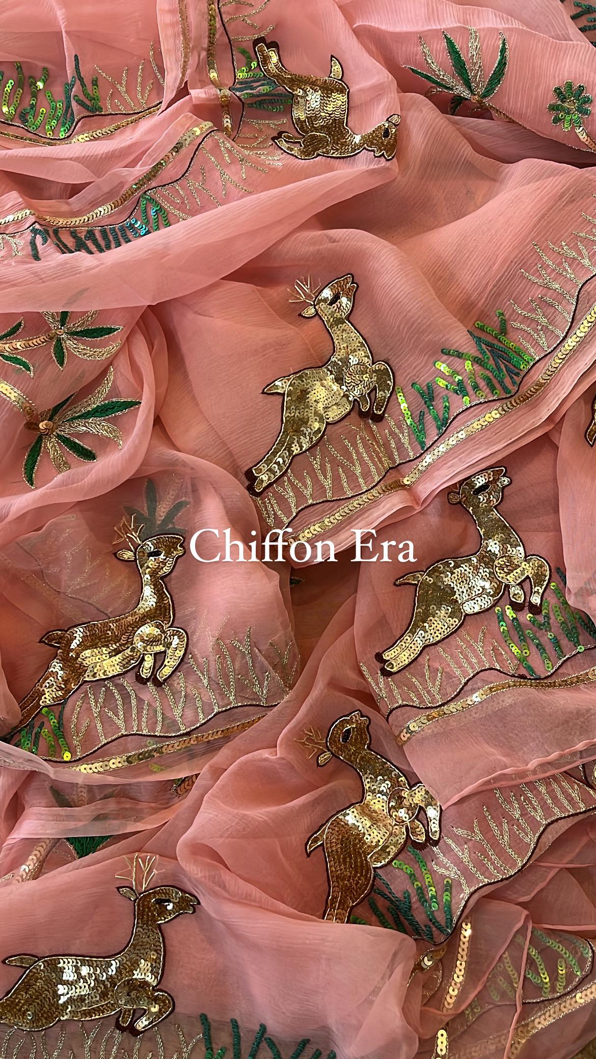 Peach pure chiffon saree adorned with Rani Blouse