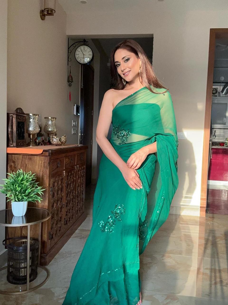 Embrald green pure chiffon handcrafted sequins saree with blouse