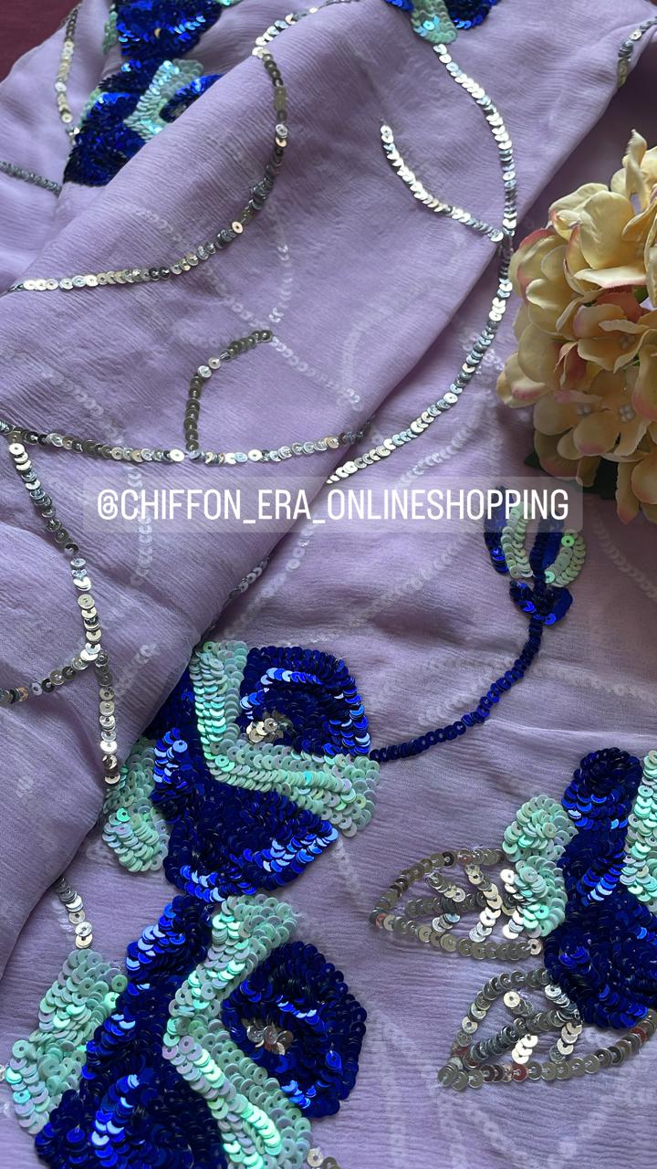 Lilac pure chiffon handcrafted saree with sequins jaal comes with beautiful crepe blouse with work