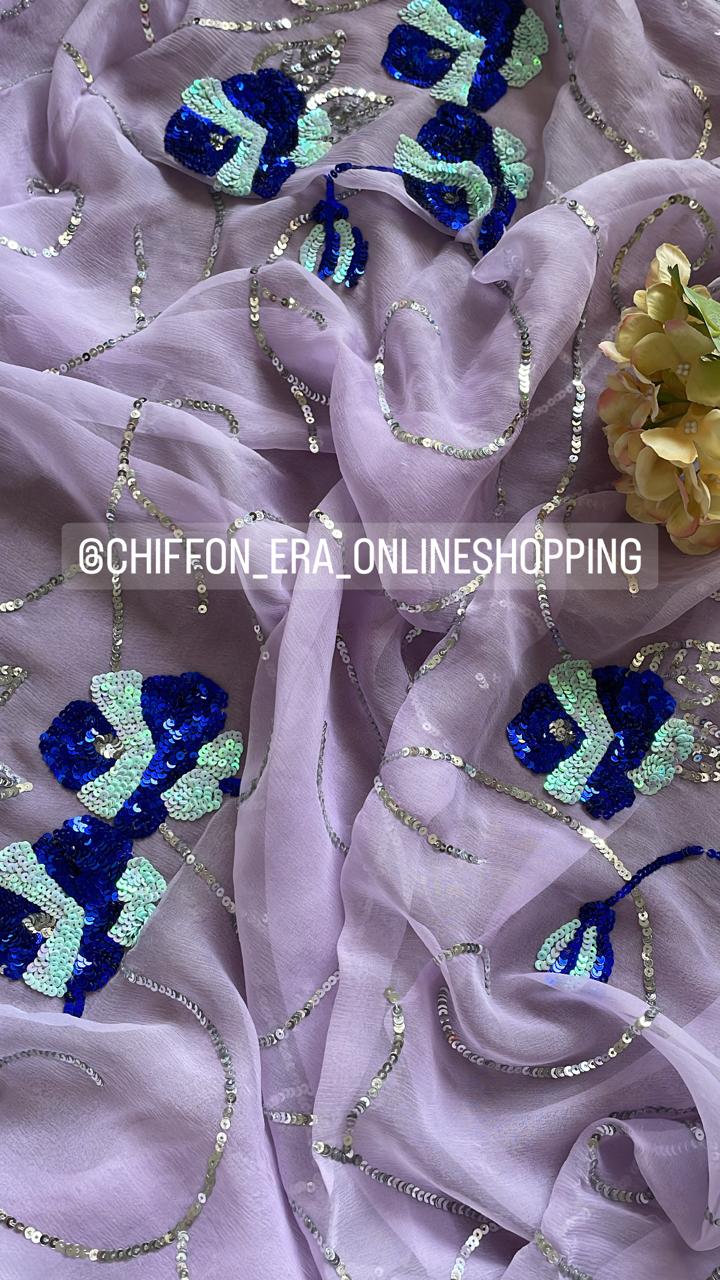 Lilac pure chiffon handcrafted saree with sequins jaal comes with beautiful crepe blouse with work