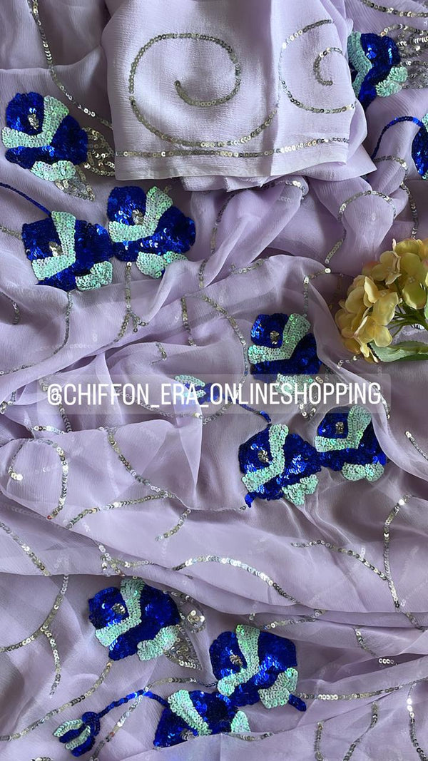 Lilac pure chiffon handcrafted saree with sequins jaal comes with beautiful crepe blouse with work