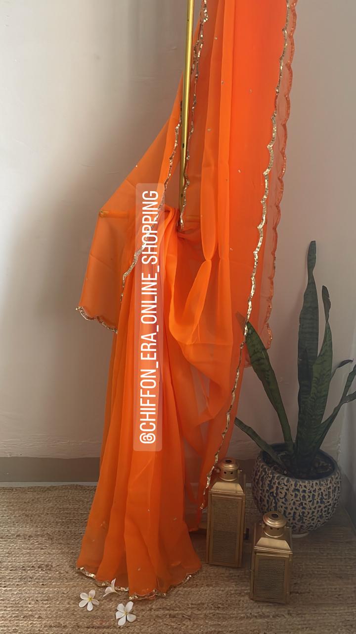 Bright orange scallop sequins saree with crepe blouse