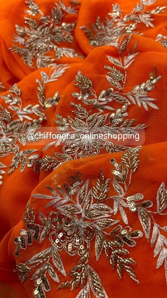 Tangerine handcrafted pure chiffon saree with work blouse