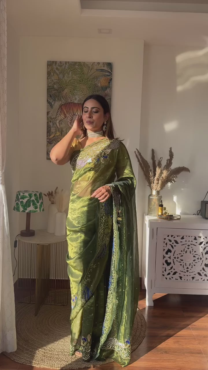 Pure zari tissue bottle green Saree